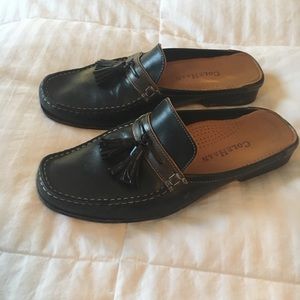 Cole Haan leather slides.